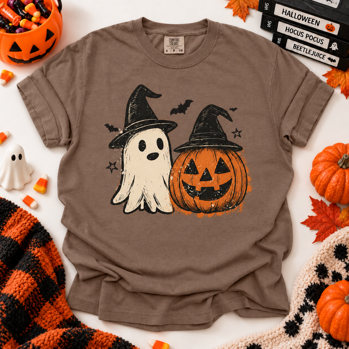 Espresso Vintage Ghost & Pumpkin Tee with rolled sleeves in a Halloween boutique flat lay