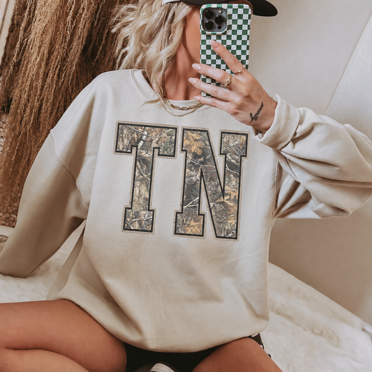 TN Washed Camo Crewneck on a model, Sand Gildan G18000 sweatshirt.